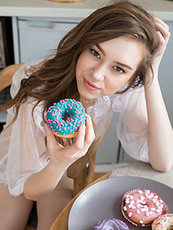 DirtySexNet presents: If you are a fan of skinny girls, check out how this cute little doll poses and teases totally naked in the kitchen.