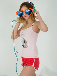 DirtySexNet presents: This doll really knows how to have fun with her and how she can show off her pussy and listen to some beats at the same time.