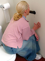 DirtySexNet presents: Blonde girl Jamie sits on the toilet and blows a black gloryhole dong